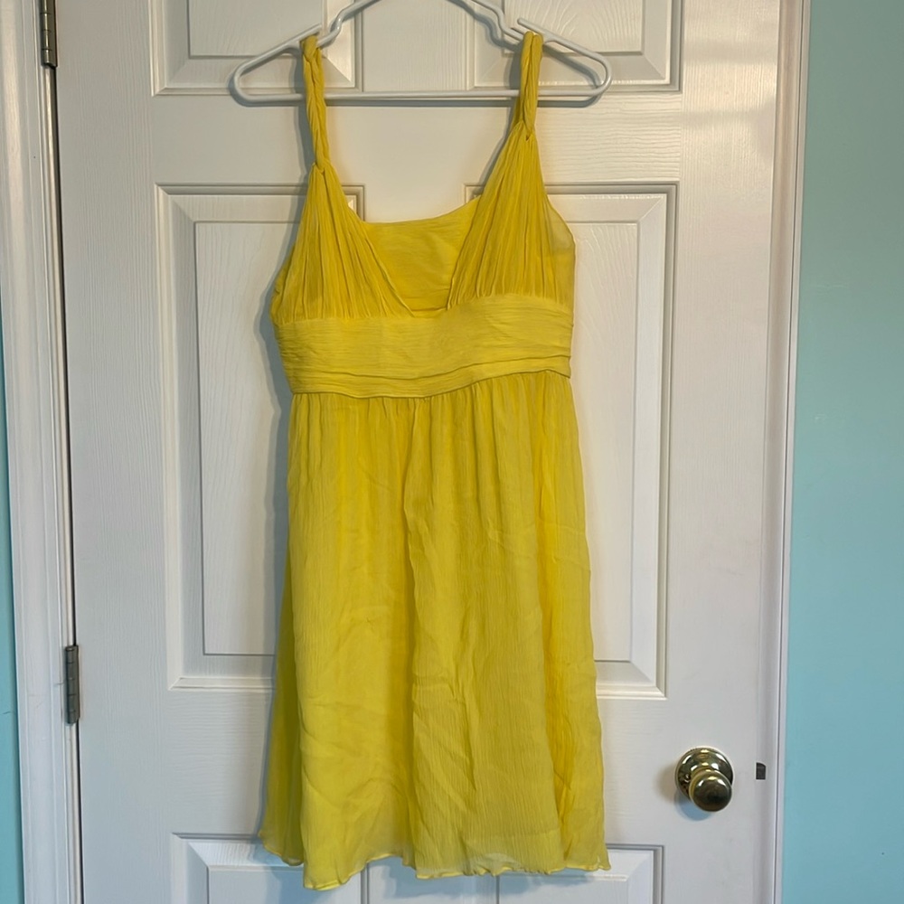 Yellow chiffon babydoll dress.